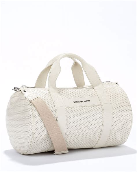 michael kors white duffle bag|michael kors travel suitcase.